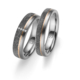 Tantalum Partnerringe TA-07 und TA-08 jetzt online entdecken. Trauringe in Tantal 999, komplett in Handarbeit hergestellt mit Rosègoldeinlage. Damenring mit 4 Diamanten im Brillantschliff. Juwelier Winkler Onlineshop